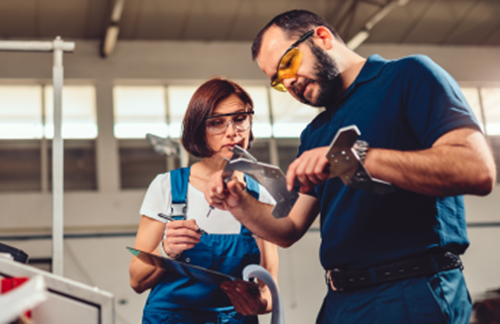 Female and male engineer working together