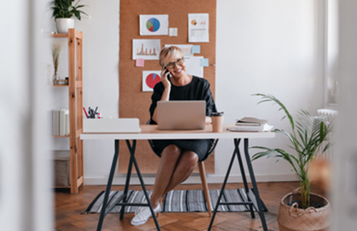 Older Woman Working Happy From Home Office