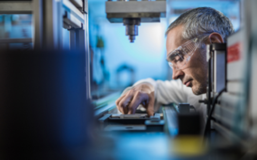 Male engineer working in lab