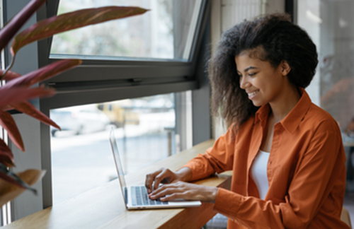 Young Woman Remote Working On Laptop