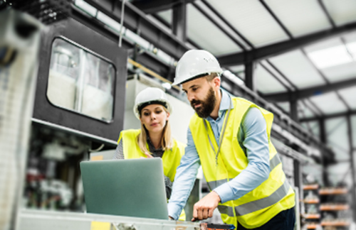 Man And Woman In Factory