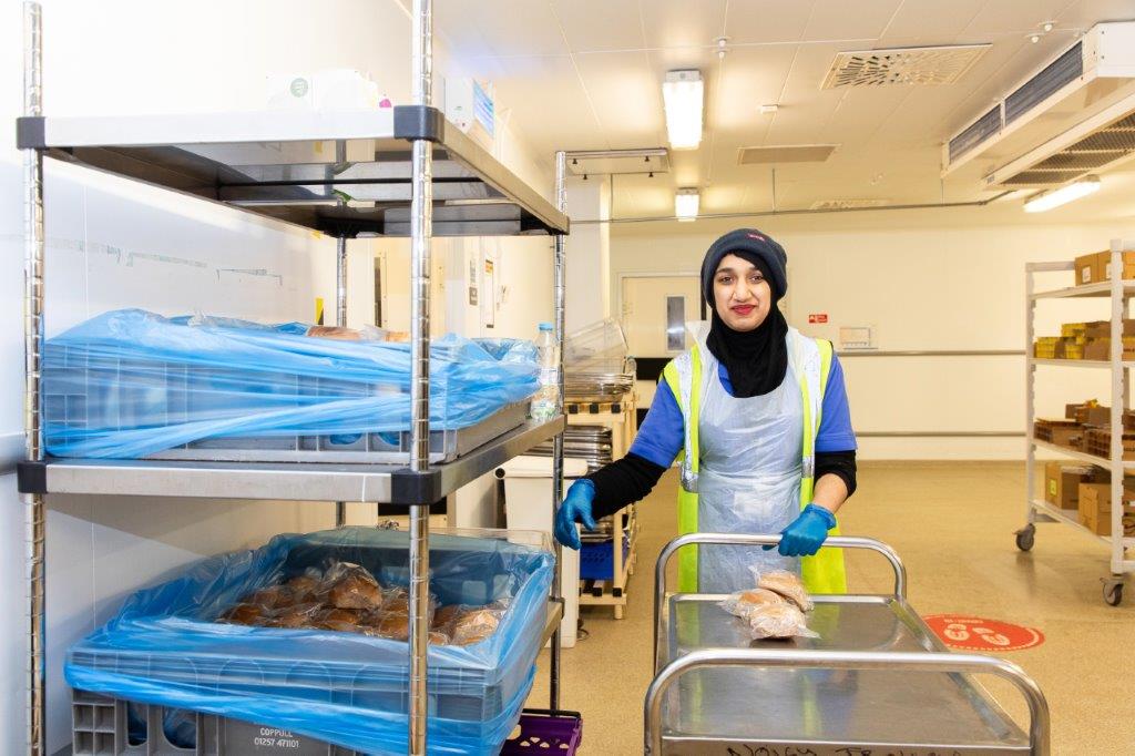 Woman in hospital catering